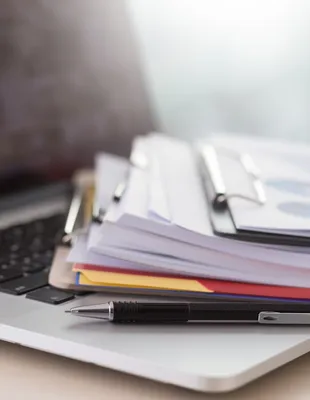 Laptop and Paperwork_edited