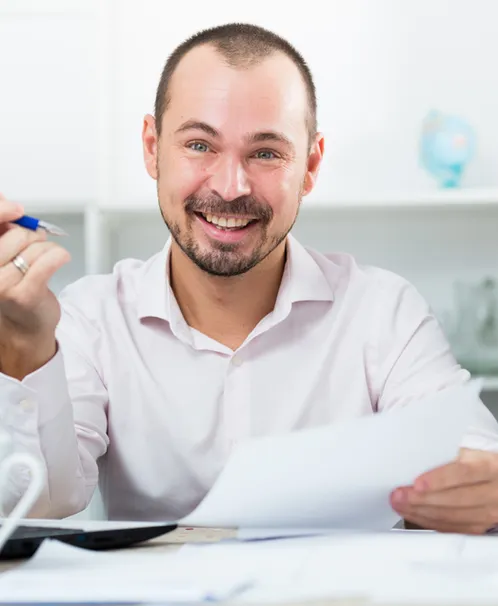 https://successvision.ae/wp-content/uploads/2024/05/Office-employee.webp